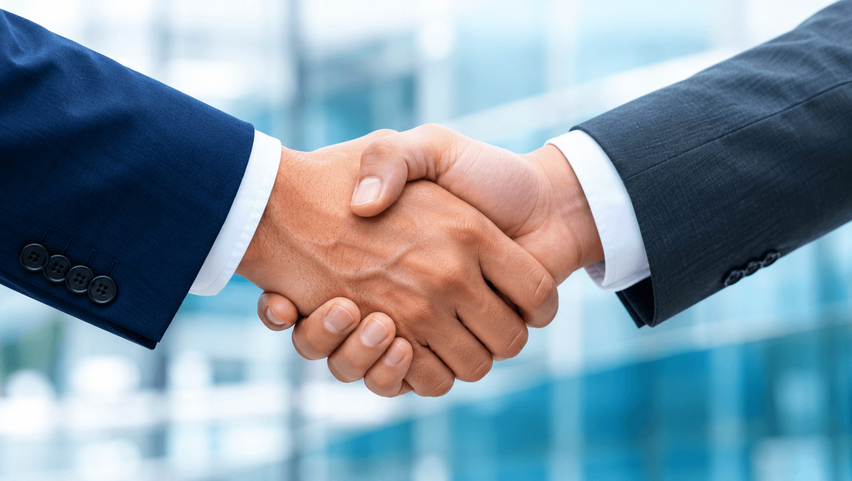 Business partners shaking hands